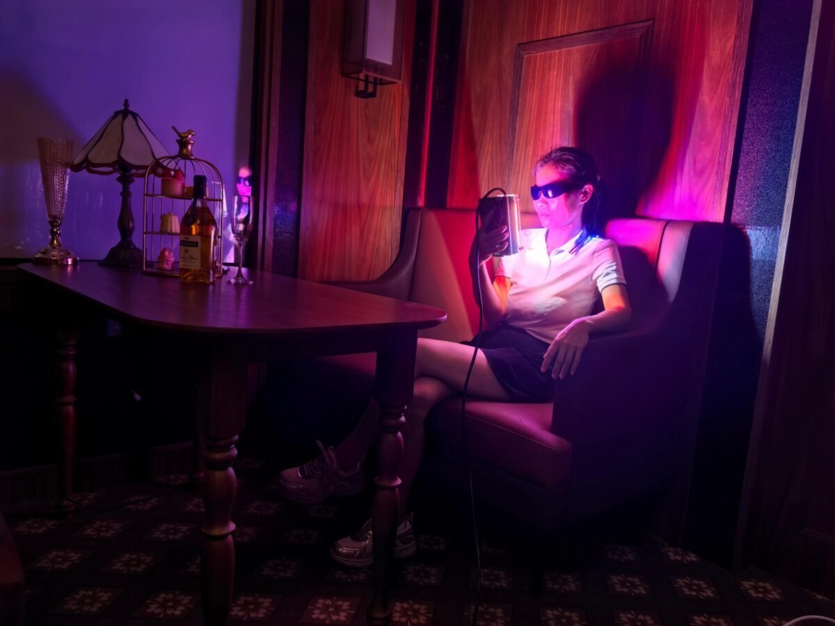 Sweet Aurora-O light therapy device in a cozy lounge setting for mental clarity and sustained focus